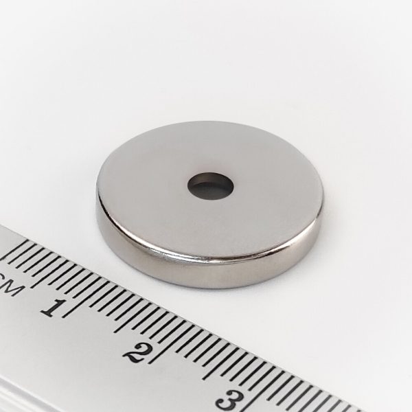 Cilindru magnet neodim 23x4 mm cu gaura M4 (polul nord pe partea cu gol) - N38