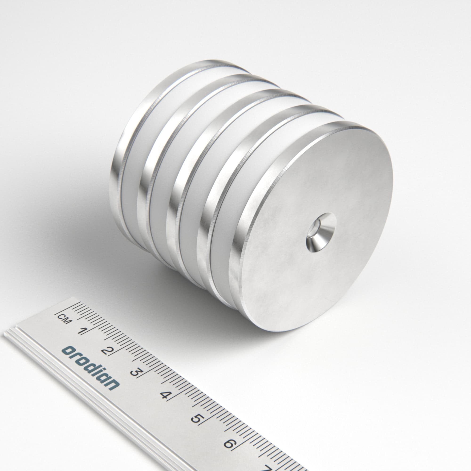 Magnet neodim cilindru 50×4 mm cu gaură M4 (polul nordic pe partea cu adâncitură) – N35